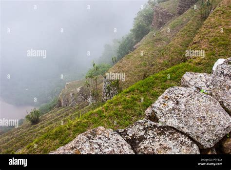 Inca architecture on a cliff Stock Photo - Alamy