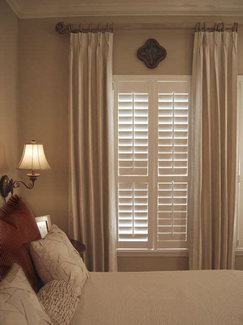 Plantation shutters with curtains