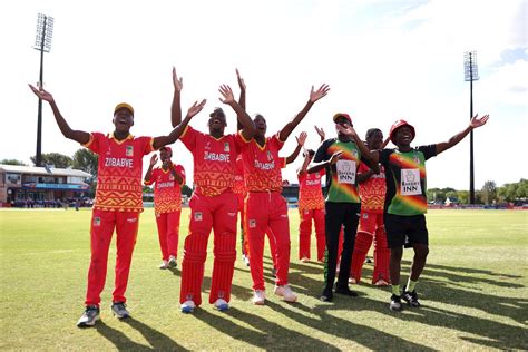 The Zimbabwe players celebrate in front of their supporters | ESPNcricinfo.com