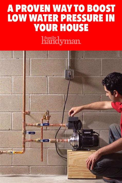 a man working on a water heater in front of a brick wall with the words ...