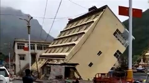 5-story building washed away - CNN Video