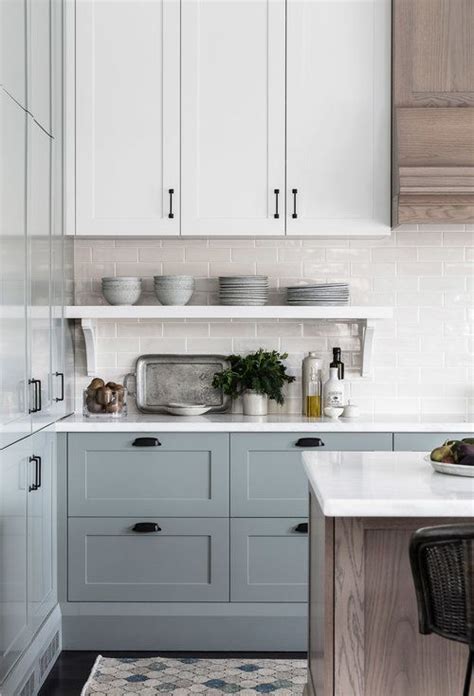 Soft blue gray kitchen cabinets are so stunning and love the mix of ...