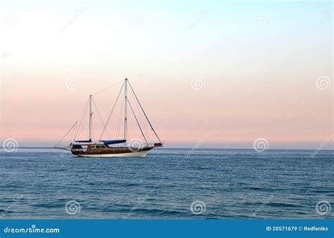 Yacht at sunset stock image. Image of background, sailboat - 20571679