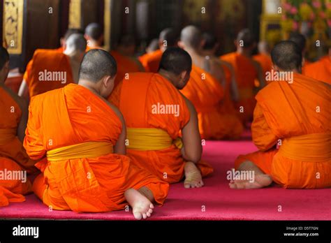 Thai Buddhist monks praying in the temple of Wang Lang district Stock Photo, Royalty Free Image ...