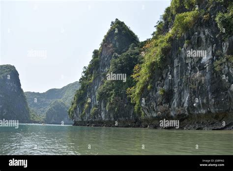 Kayaking in Ha long bay Stock Photo - Alamy