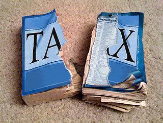 torn tax form | Taxing work is crazy. As Adam Smith and just… | Flickr