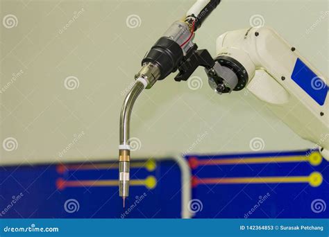 Close Up Industrial Weld Robot Arm with Mig Electrode Holder or Torch for Industrial at Factory ...