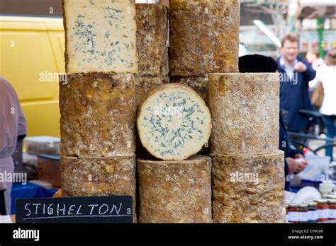 Truckles of Stichelton cheese at Borough Market in London Stock Photo ...