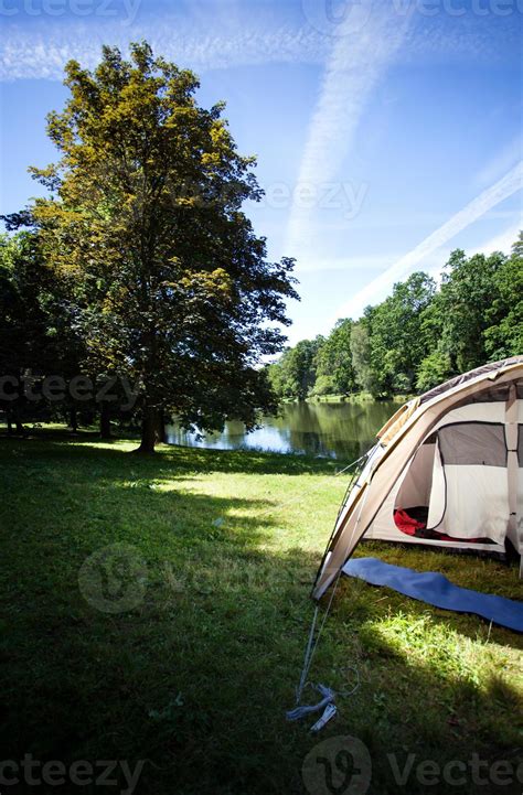 Camping by the lake 792861 Stock Photo at Vecteezy