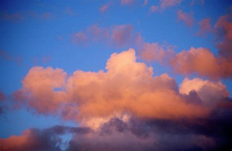 Cumulus Clouds In Sky At Sunset Photograph by Andrew Holt - Fine Art ...