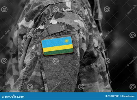 Flag of Rwanda on Soldiers Arm. Rwanda Flag on Military Uniform Stock ...