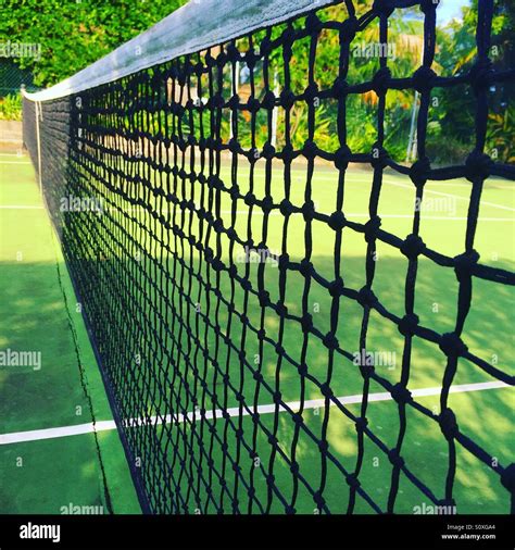 Tennis court net Stock Photo - Alamy