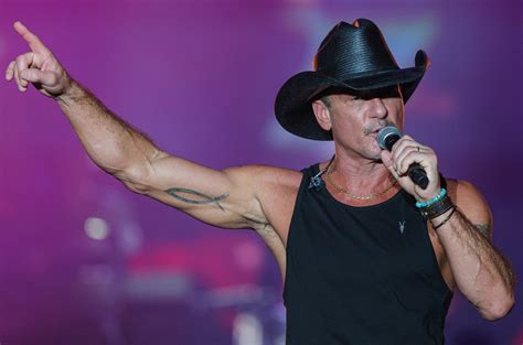 Tim McGraw Falls Off Stage During Concert, Greets Fans