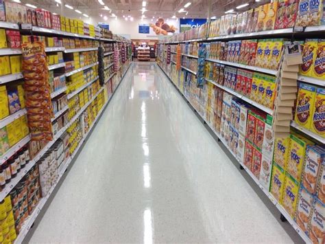 Fully stocked shelves at a grocery store's grand opening ...