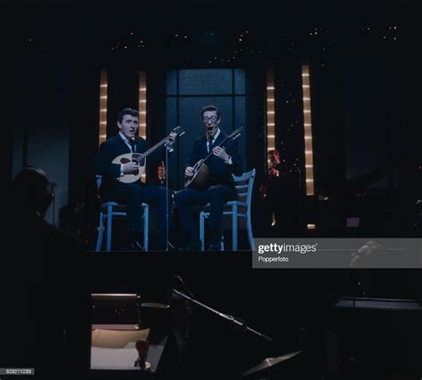 Guitarists Bruce Welch and Hank Marvin of The Shadows perform live on... News Photo - Getty Images