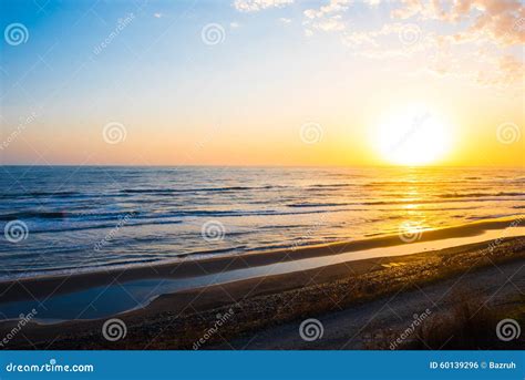 Bright yellow sun, sunrise stock photo. Image of coast - 60139296