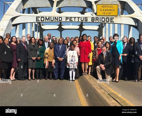 Congressman John Lewis and other politicians at the Edmund Pettus Bridge on the 53rd anniversary ...