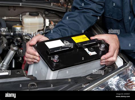 Vehicle battery installation Stock Photo - Alamy