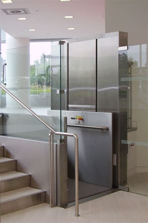 Glass Vertical Wheelchair Lift - Elevators | Nationwide Lifts