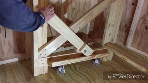 Retractable wheels for heavy workbench. - YouTube