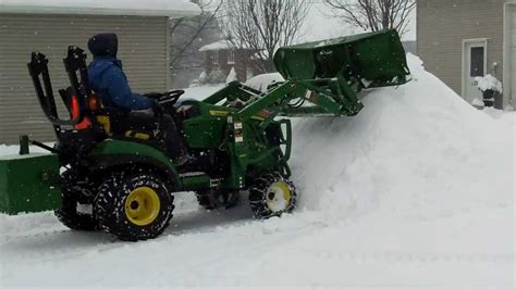 john deere 1026r plowing snow 1 - YouTube