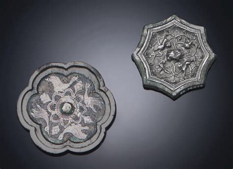 TWO MINIATURE SILVER-DECORATED BRONZE HEXAGONAL MIRRORS , TANG DYNASTY (618-907) | Christie's