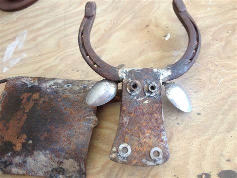 Steer shovel yard art | Metal art, Welding art projects, Scrap metal art