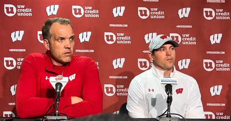 UW Athletic Director Chris McIntosh and interim coach Jim Leonhard ...