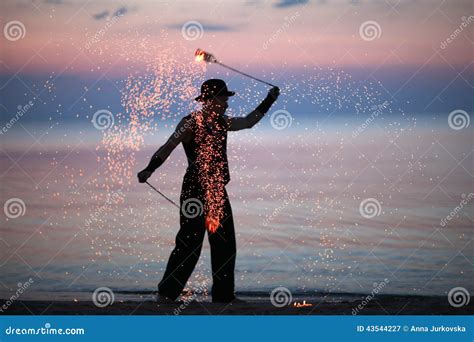 Fire Dancer Silhouette on Sunset Sky Background Stock Image - Image of fakir, dancer: 43544227