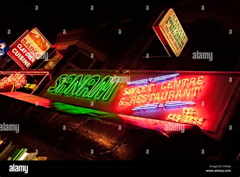 Manchester curry mile rusholme wimslow road with neon shop signs sanam ...