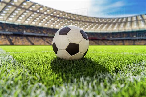 Close up view of soccer ball on grass on soccer field stadium - Stock ...