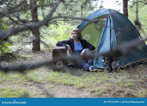 Ultimate Form of Off-grid Living, Woman in Camping Tent with Her Things in Suitcase Stock Image ...