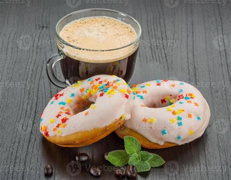 Coffee with donuts 11527256 Stock Photo at Vecteezy