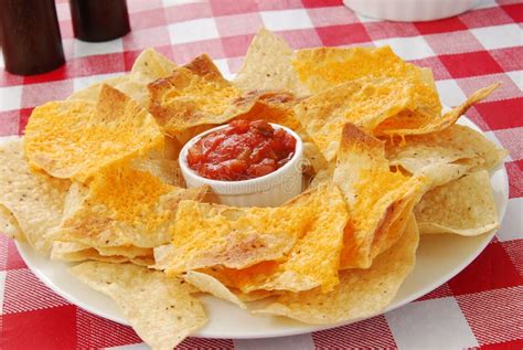 Nachos with melted cheese stock photo. Image of treat - 17380034