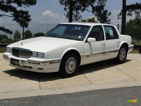 White Diamond 1990 Cadillac Seville STS Exterior Photo #49647575 | GTCarLot.com