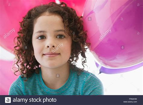 young girl with helium balloons Stock Photo - Alamy