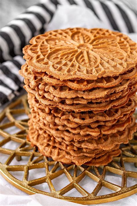 Crispy Chocolate Pizzelle Recipe -- this easy chocolate pizzelles recipe produces light and ...