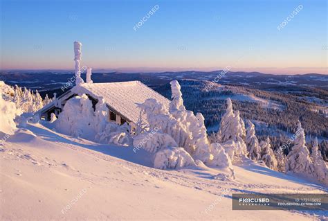 Germany, Bavaria, Bavarian Forest in winter, Great Arber, Zwiesel hut in the evening — niemand ...