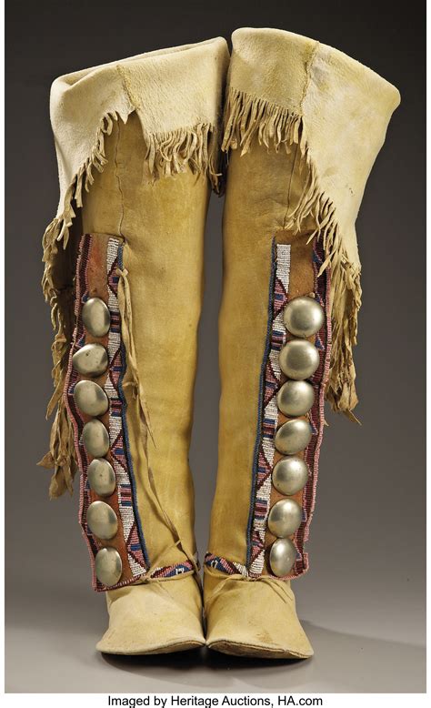 A PAIR OF KIOWA WOMAN'S BEADED HIDE BOOT MOCCASINS. c. 1880... | Lot ...