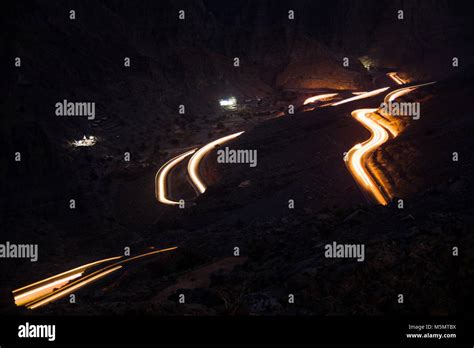 Light trails on Jabal Jais mountain road at night, UAE Stock Photo - Alamy