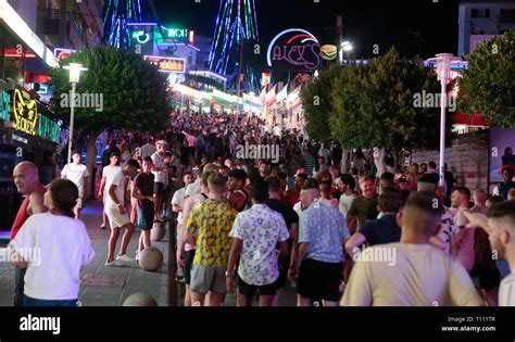 Tourists enjoy nightlife in Punta Ballena street in Magaluf Mallorca ...