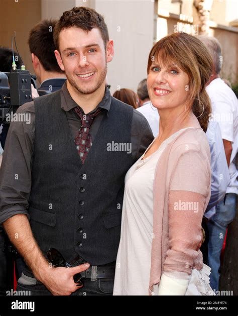 Sean Harmon, son of actor Mark Harmon, left, and Pam Dawber attend a ceremony awarding Mark ...