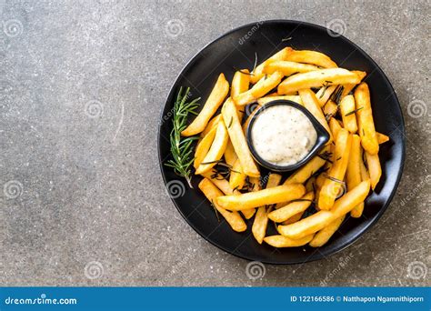 French fries with sauce stock photo. Image of tartar - 122166586