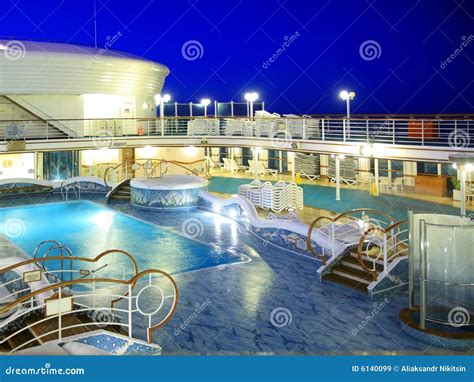 Cruise ship deck at night stock image. Image of pool, transportation ...