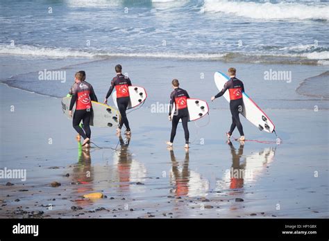 Surfing. Surfers and surf school on Las Canteras beach in Las Palmas ...