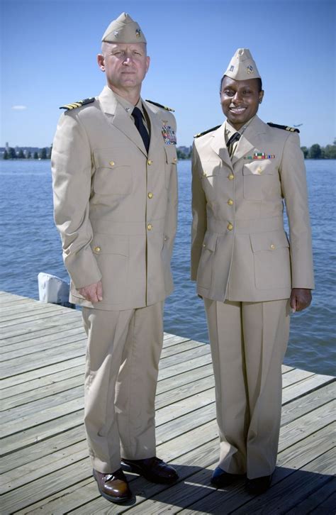 Two naval officers showcase the service dress khaki uniform in ...