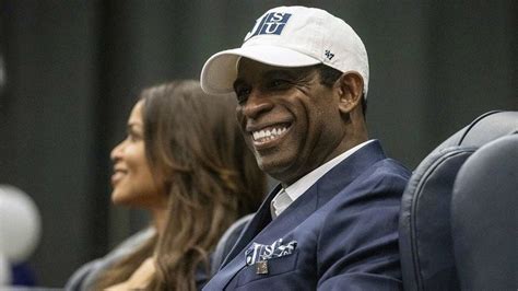 Deion Sanders smiles as he is introduced as Jackson State's head ...