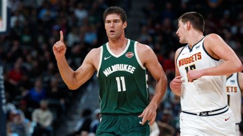 Lopez makes eight three-pointers, Bucks beat Nuggets - TSN.ca