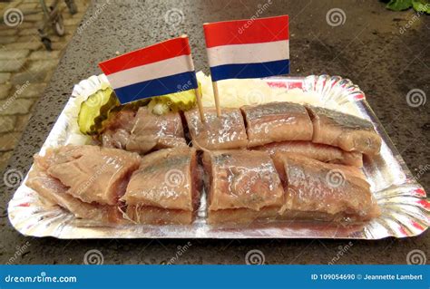 Dutch Herring Snack with Flags Stock Photo - Image of market, green: 109054690