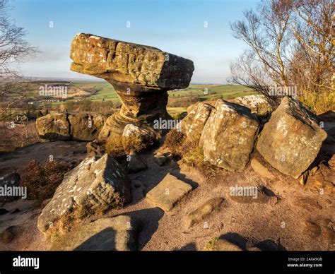 The Druids Writing Desk gritstone rock formation at sunset Brimham ...